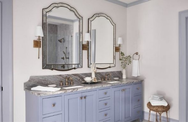 Vintage inspired blue double-vanity in stunning bathroom