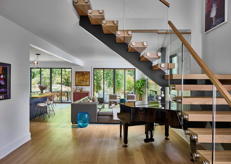 new_build_cabbagetown_modern_foyer_floating_stairs_livingroom_atlanta_ga